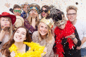 Party people with confetti